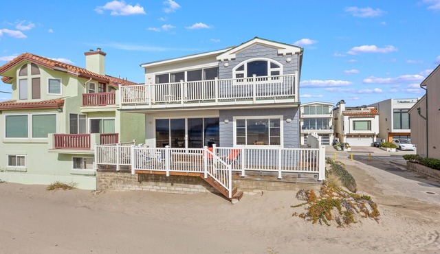 Beachfront abode with spacious deck, pool table, gas grill, smart TVs, & W/D in Oxnard