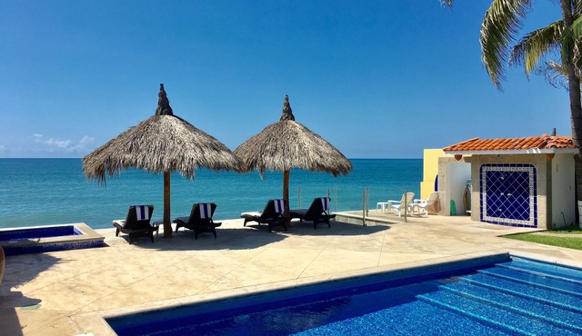 Beachfront villa, heated pool, jacuzzi. Sleeps 16 perfect sunsets every night