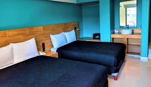 Bright Coastal Deluxe Room Perfect for Relaxing Getaways Near the Shore