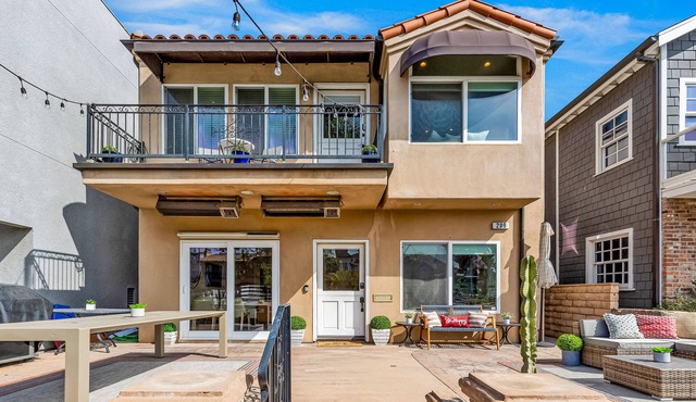 Bright home on the channel with expansive patio & elevator