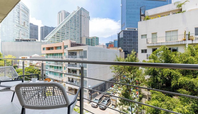 Capitalia | Chic Two-Bedroom Living and Roof views