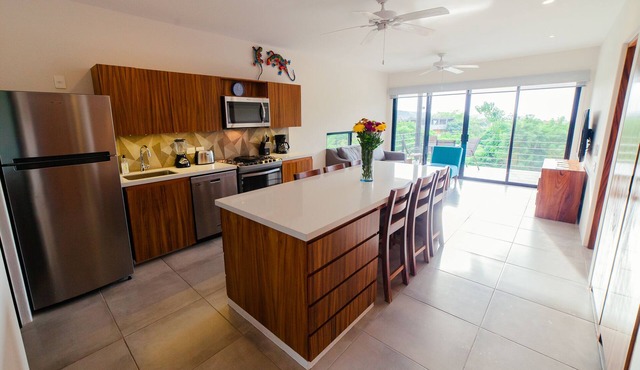 Centrally located with private rooftop terrace with views, BBQ and shared pool.