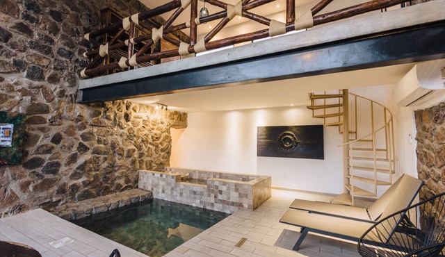 Climatized indoor pool/studio, stone walls -modern/rustic, very intimate space.