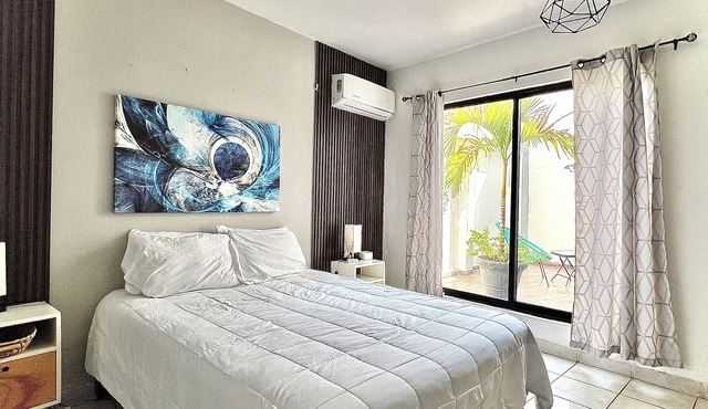 Comfortable modern apartment conveniently located for shopping and dining.