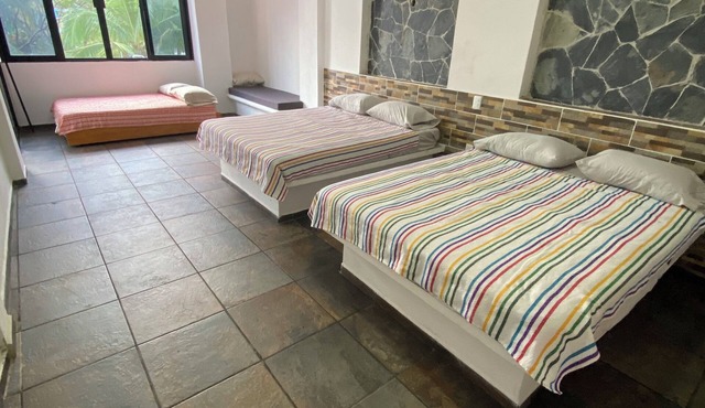 Cozy apartment for 8 in tranquil Los Ayala with 2QS beds, 1 dbl bed, 2 sofas.