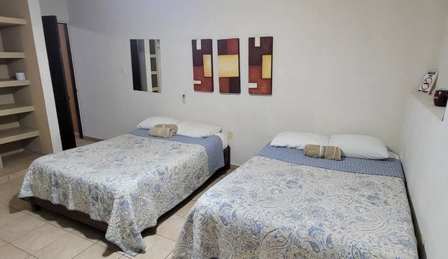 Departamento 2 camas matrimoniales K, wifi, Aire acondicionado, estacionamiento cruzando calle