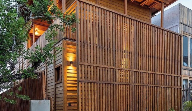 Eco‑Chic Wood 3BR Casa with Pool & Rooftop views