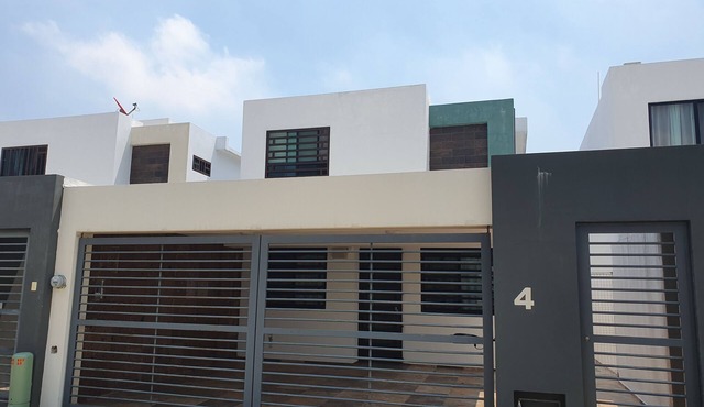 Entire house furnished 3 bedrooms 3 bathrooms security heated parking.