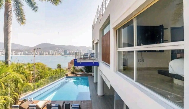 Espectacular casa en Brisas Guitarron con la mejor vista a la Bahia
