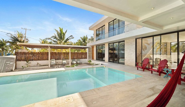Exclusive Beachfront Escape | Modern Design, Pool & Fast WiFi