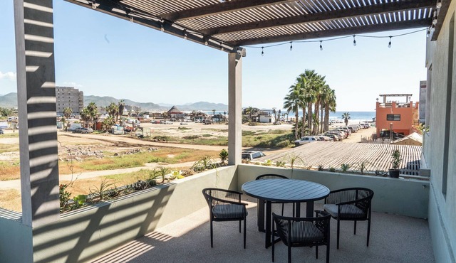 First floor oceanview condo w/two private patios steps to the main beach at Playa Cerritos. Modern 2-bedroom home, a 1-minute walk to the beach, perfect for families or couples looking for quiet luxury and reliable Wi-Fi.