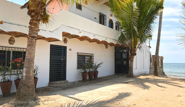 Five bedroom beachhouse with stunning views, quiet swimming beach and pool.