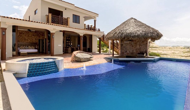 Gorgeous 3 Bedroom Beachfront Villa with Swim Up Bar