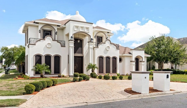 Grand estate in upscale neighborhood w/nice pool