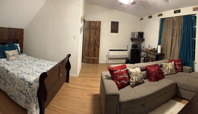 GREAT STUDIO SUITE...above garage suite over looking pool
