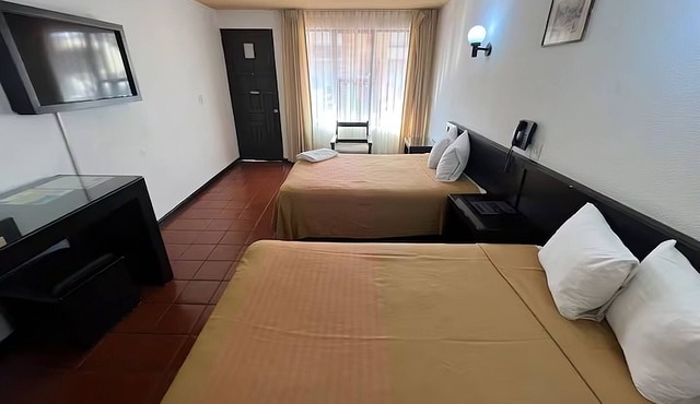 Hotel Villa Capri, 2 camas dobles 4 Huéspedes