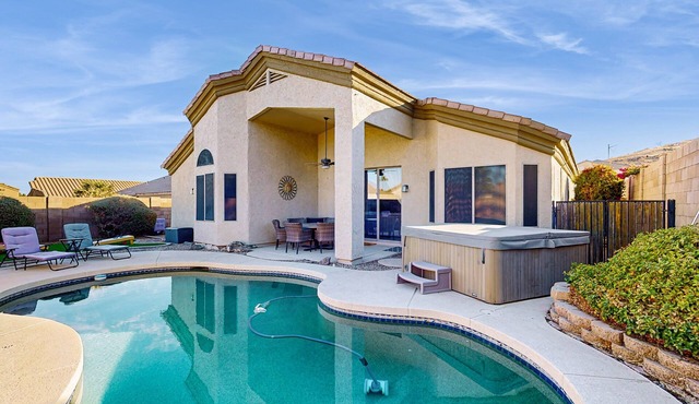 Inviting home with pool, hot tub, enclosed yard, fast WiFi, & W/D