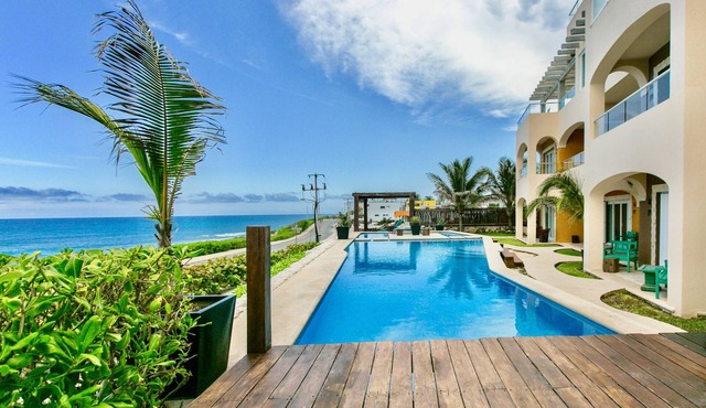 Luxury condo rooftop pool with 360° ocean views