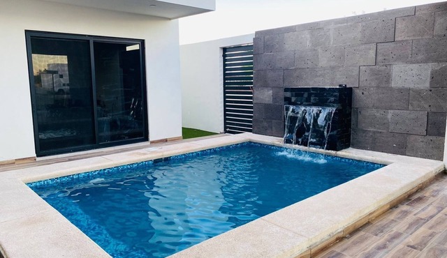 Luxury minimalist 3-bedroom house welcoming you with a private pool.