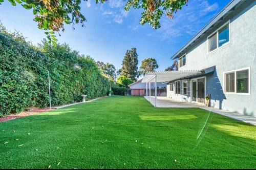 Marbella Lane Modern Home w Private Backyard