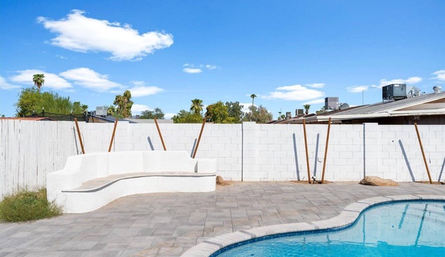 Mesa home with a pool, hot tub, and easy access to golf, dining