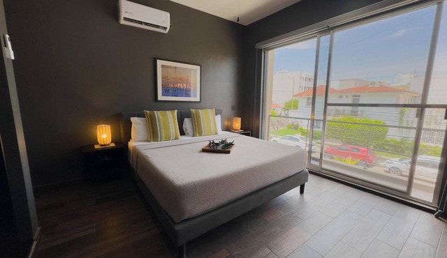 Modern 2‑Bed Condo in Golden Zone: Walk Everywhere!