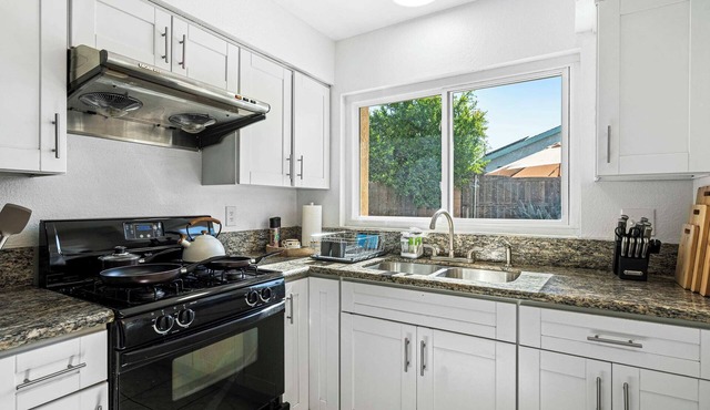 Modern 4B Retreat with Cozy Decor & Spacious Patio