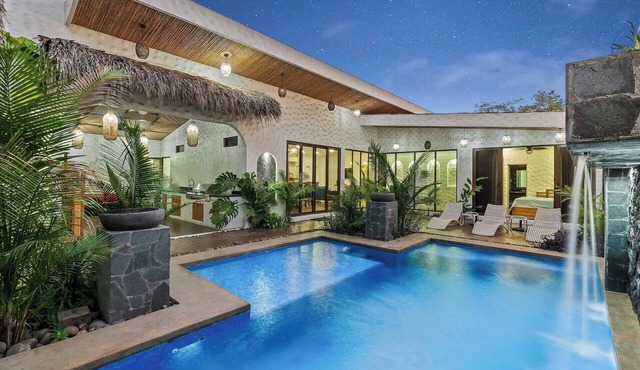 Modern Home with Chic Bohemian Style and “Zen” Outdoor Oasis with Swimming Pool and Tiki-Style Dining Space