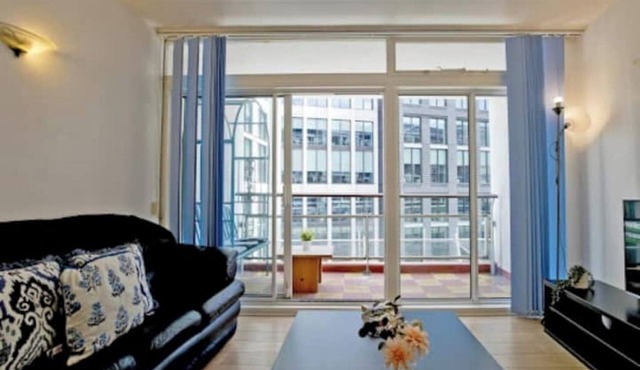 Modern West End Hideaway with Balcony — Steps from Tottenham Court Road Station