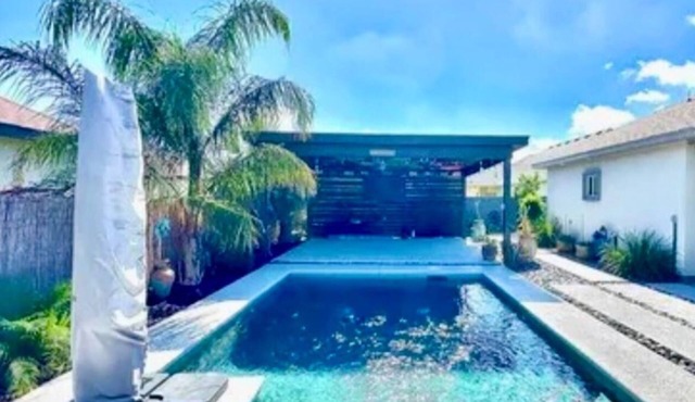 North Brownsville home with pool and pergola.nBeautiful backyard oasis feeling.