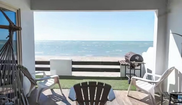 Oceanfront ground level condo on a Private Beach in a lovely resort!