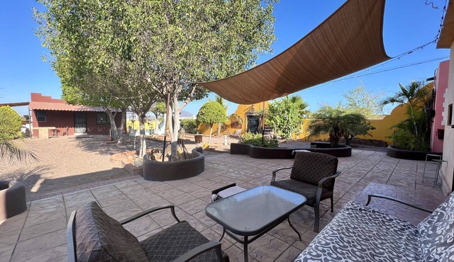 One lot with main house, casita, and large green yard