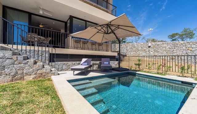 Private and heated pool with arch view new condo!