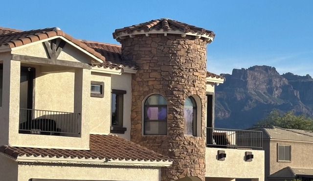 Relax at a 4 bedroom retreat at the base of the iconic Superstition Mountains!