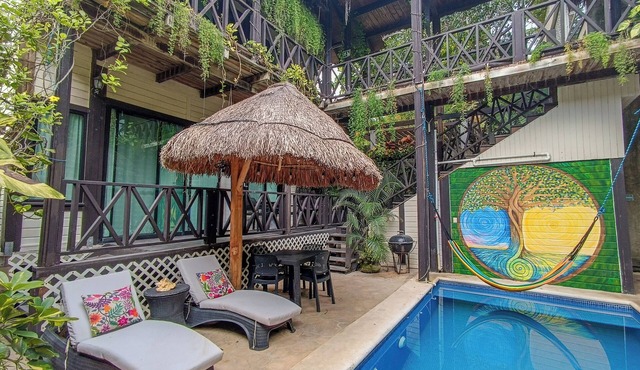 Romantic spacious cabin with large balcony overlooking pool. Great location!
