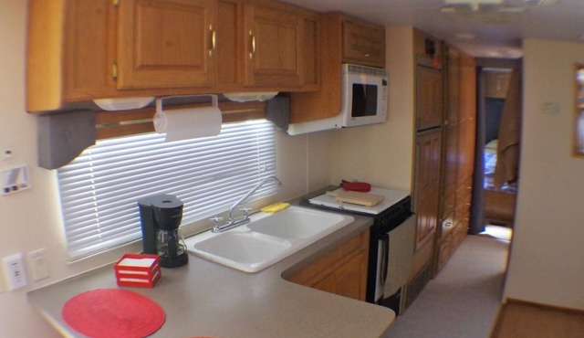 RV on private lot with pool 10 min walk to the beach