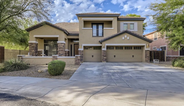 Spacious home in the heart of the West Valley with heated pool and game room