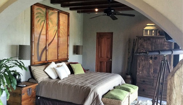 Spend the day at the Soggy Peso Palapa Bar, and spend the night in The Penthouse