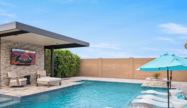 Stunning Modern Home w/Beautiful Saltwater Pool and Many Amenities.