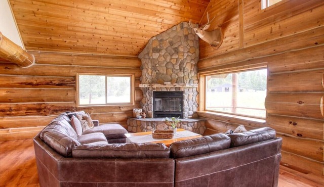 The Cabin · Rustic Log Cabin with Pasture and Mountain Views