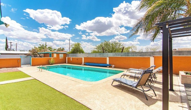 This centrally located 1 bedroom features a full size pool and electric vehicle charging on site.