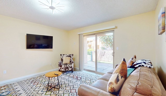 Updated condo in great location with private patio, outdoor pool, hot tub, W/D