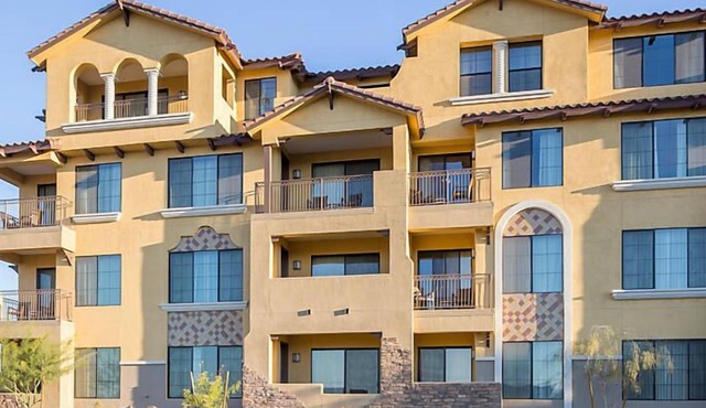 UpScale Resort with Outdoor Heated Pool with a waterslide and a poolside bar, tennis court and gym