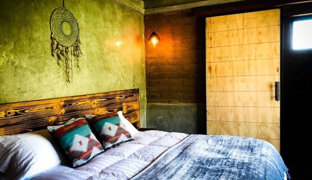 UvaUva 1| eco-retreat |King size bed-balcony