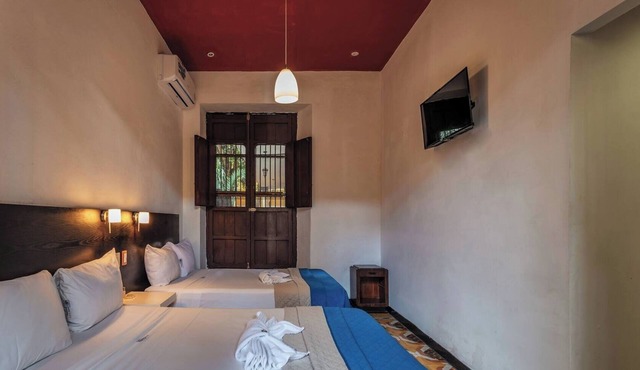 Vibrant Three Room Retreat Steps from Downtown’s Culture, Dining & Nightlife
