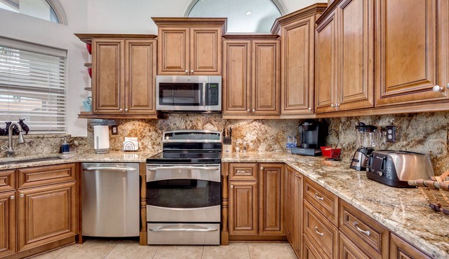 Waterfront Home w/Heated Pool and 1 Garage Spot Near Shops!