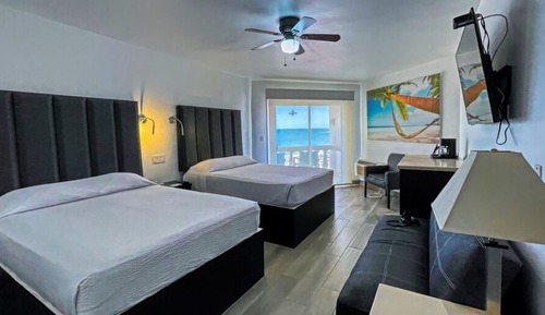 Deluxe Room, Multiple Beds, Balcony, Partial Ocean View
