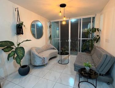 One-Bedroom Apartment with Balcony and City View